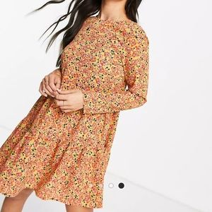 Asos Design Long Sleeved Tiered Smock Mini Dress in Ochre Floral Print